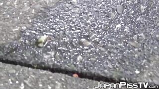 Tantalizing Japanese girl peeing in front of someone bicycle