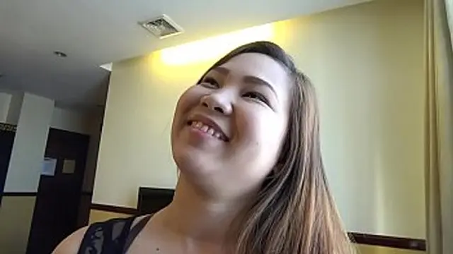 Chubby Asian escort in hotel room